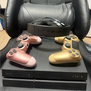 Play station console and headset with Rose Gold & Gold PlayStation Controllers
